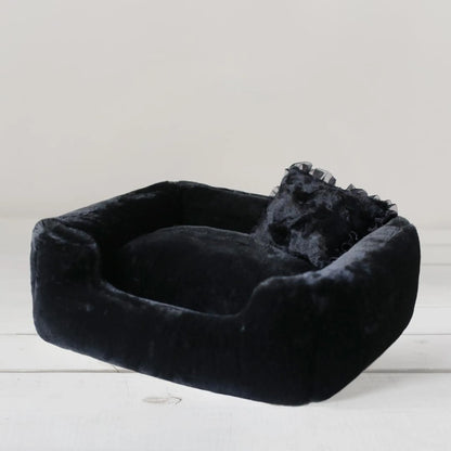 Divine luxury bolster dog bed for small dogs in Dove grey, showing the low scooped front and overstuffed center pillow