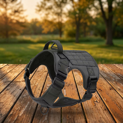 Tactical dog harness with handle - Black, on a wooden porch